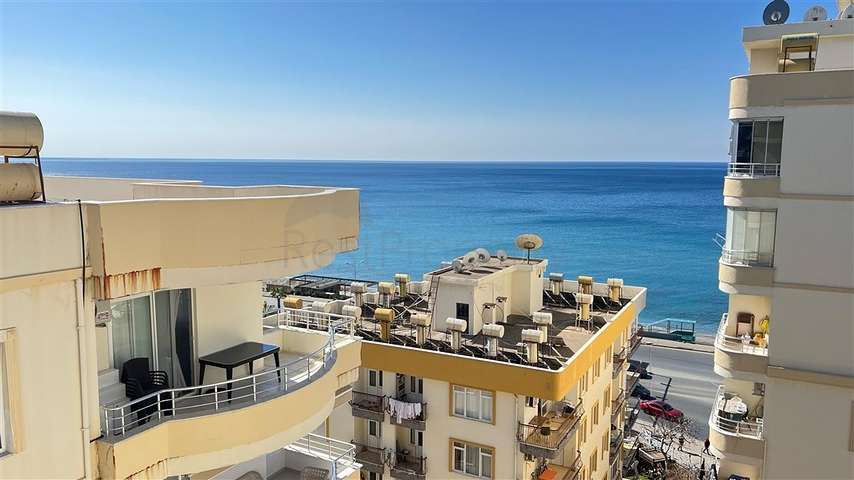 Sea-Front 2+1 Apartment in Tosmur, Alanya with Direct Beach Access