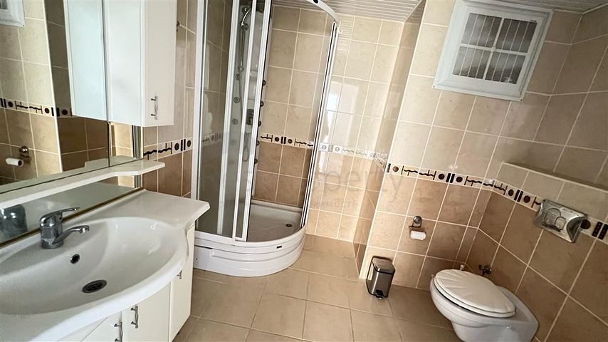 Sea-Front 2+1 Apartment in Tosmur, Alanya with Direct Beach Access