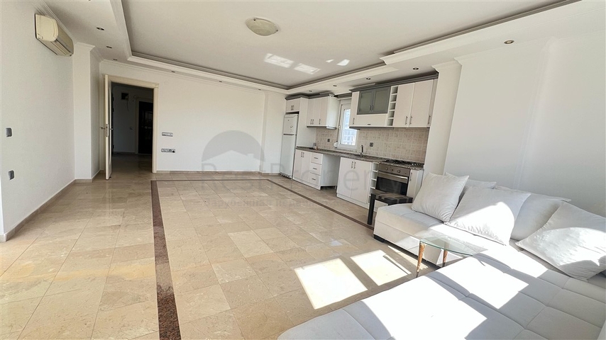 Sea-Front 2+1 Apartment in Tosmur, Alanya with Direct Beach Access