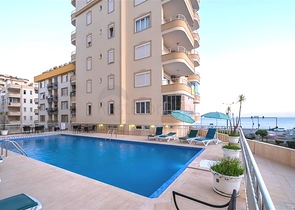 Sea-Front 2+1 Apartment in Tosmur, Alanya with Direct Beach Access