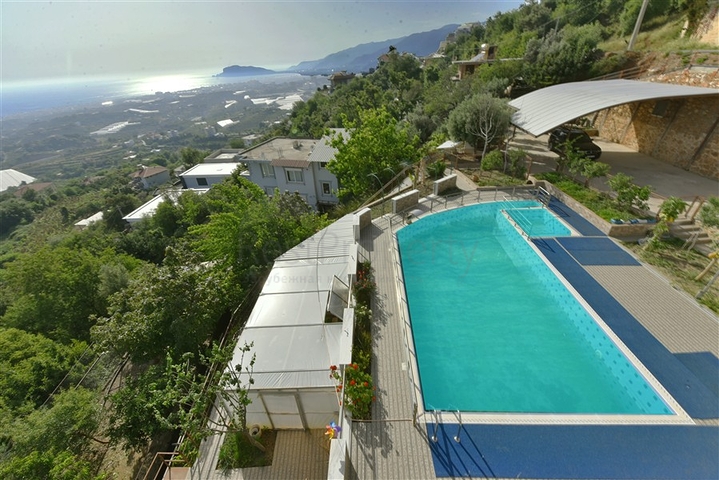 Spacious 11+2 villa with private plot and panoramic sea views