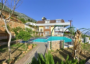 Spacious 11+2 villa with private plot and panoramic sea views