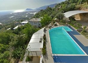 Spacious 11+2 villa with private plot and panoramic sea views