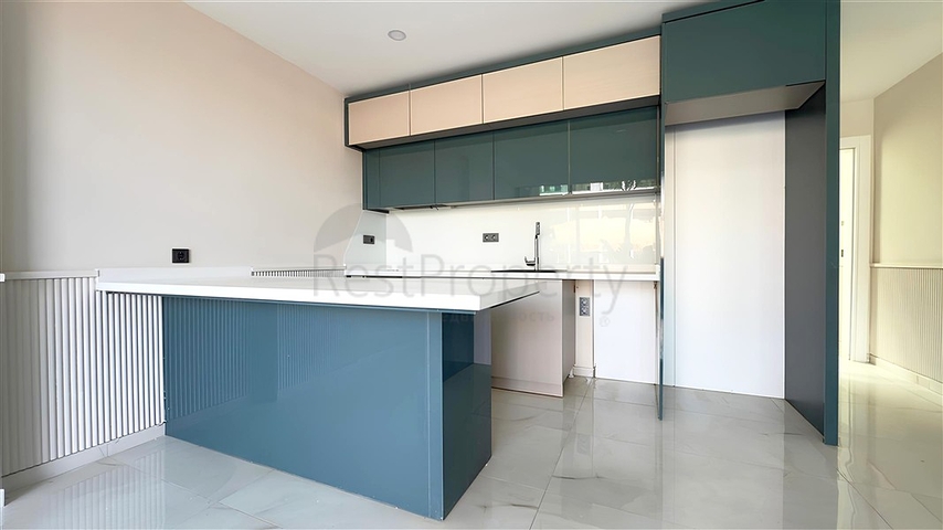 Modern duplex 2+1 with garden in a complex by the sea 