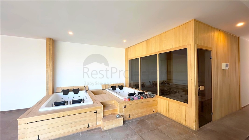 Modern duplex 2+1 with garden in a complex by the sea 