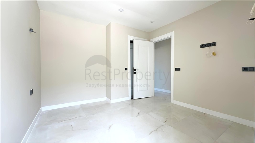 Modern duplex 2+1 with garden in a complex by the sea 