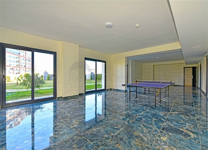 Rent a cozy 1+1 apartment with rich infrastructure in the heart of Mahmutlar