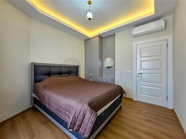 Rent a cozy 1+1 apartment with rich infrastructure in the heart of Mahmutlar