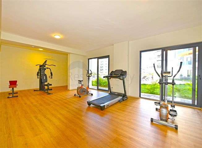 Rent a cozy 1+1 apartment with rich infrastructure in the heart of Mahmutlar