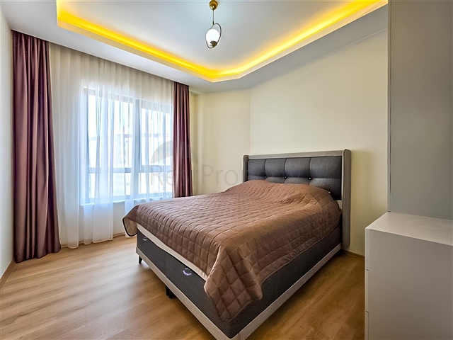 Rent a cozy 1+1 apartment with rich infrastructure in the heart of Mahmutlar