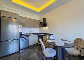 Rent a cozy 1+1 apartment with rich infrastructure in the heart of Mahmutlar