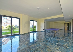 Rent a cozy 1+1 apartment with rich infrastructure in the heart of Mahmutlar