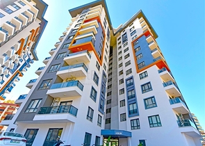 Rent a cozy 1+1 apartment with rich infrastructure in the heart of Mahmutlar