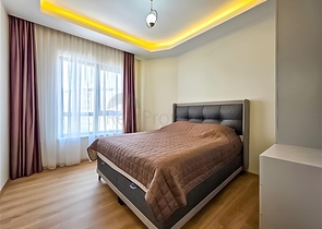 Rent a cozy 1+1 apartment with rich infrastructure in the heart of Mahmutlar