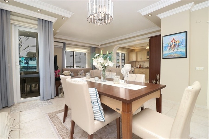 Duplex furnished 3+1 apartment with a spacious terrace in the center of Alanya