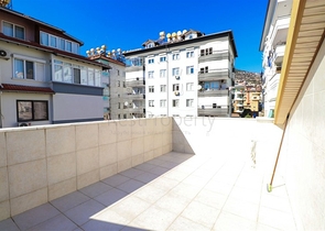Duplex furnished 3+1 apartment with a spacious terrace in the center of Alanya