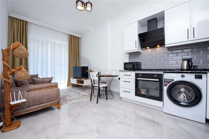 Cozy furnished 1+1 apartment in a modern complex with resort-level infrastructure