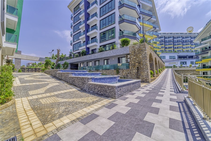 Modern 1+1 apartment with sea view just 100 meters from the beach