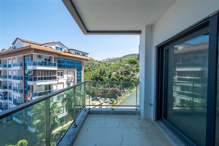 Modern 1+1 apartment with sea view just 100 meters from the beach