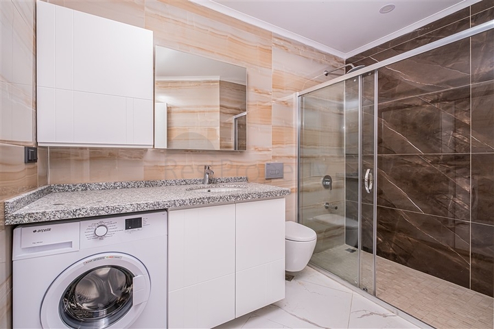 Modern 1+1 apartment with sea view just 100 meters from the beach