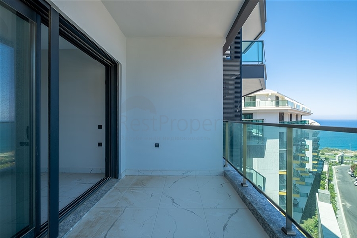 Modern 1+1 apartment with sea view just 100 meters from the beach