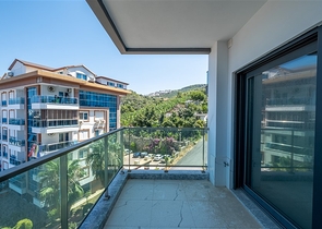 Modern 1+1 apartment with sea view just 100 meters from the beach