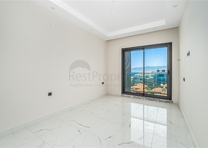Modern 1+1 apartment with sea view just 100 meters from the beach