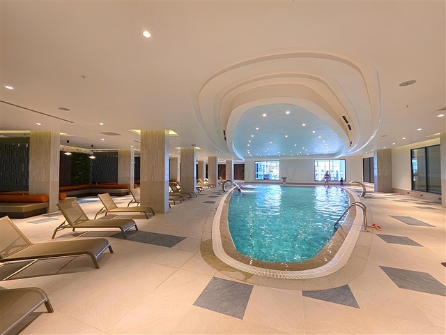 Luxury 3+1 apartment with garden in an elite complex by the sea