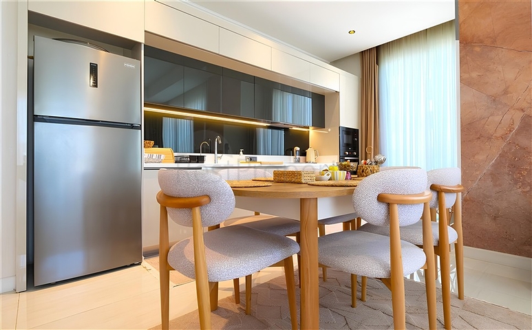 Luxury 3+1 apartment with garden in an elite complex by the sea