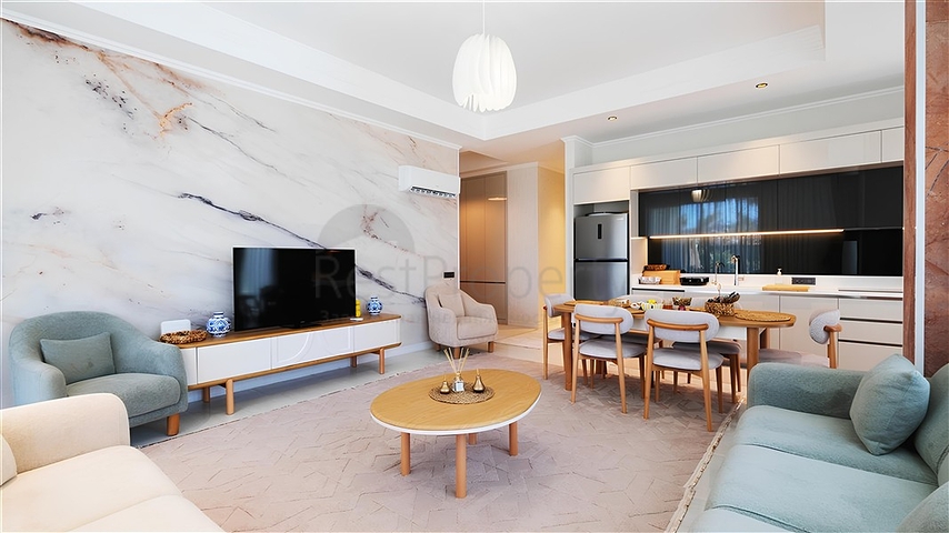 Luxury 3+1 apartment with garden in an elite complex by the sea