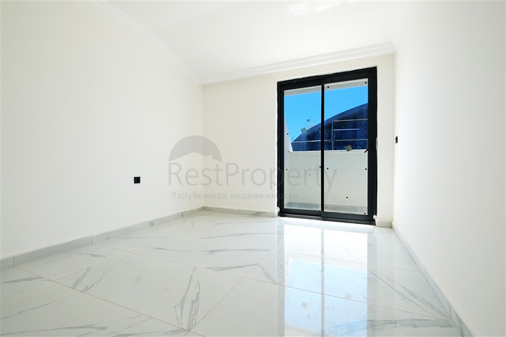 Modern 2+1 penthouse in a prestigious complex in Mahmutlar