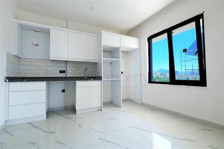 Modern 2+1 penthouse in a prestigious complex in Mahmutlar