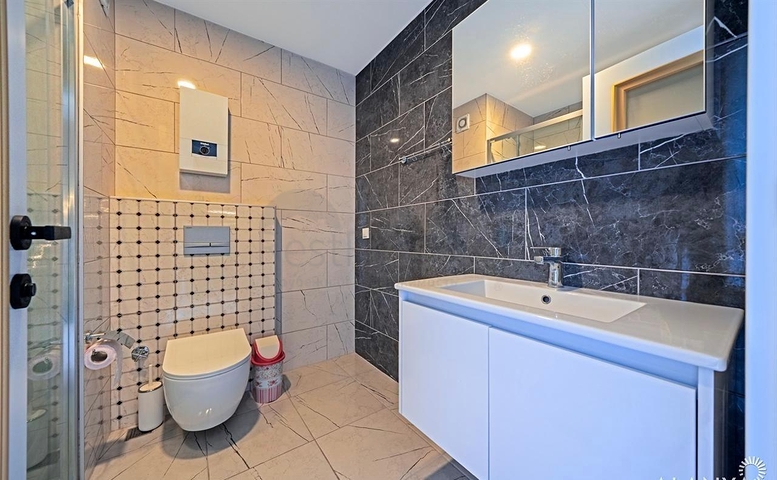 Spacious furnished 3+1 apartment in a modern residential complex in Avsallar