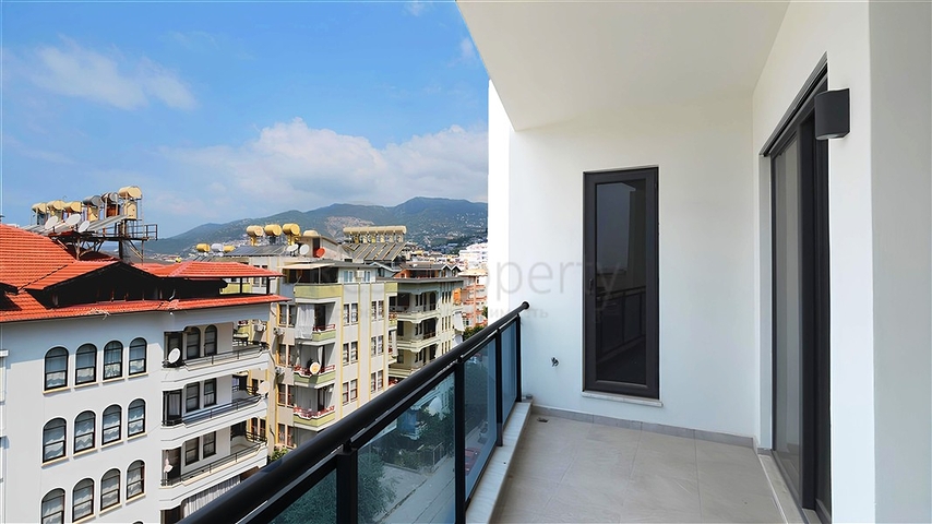 Modern 1+1 apartment in a new complex with sea view in the center of Alanya
