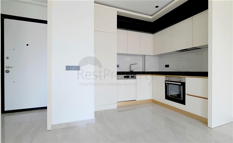 Modern 1+1 apartment in a new complex with sea view in the center of Alanya