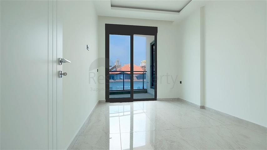 Modern 1+1 apartment in a new complex with sea view in the center of Alanya