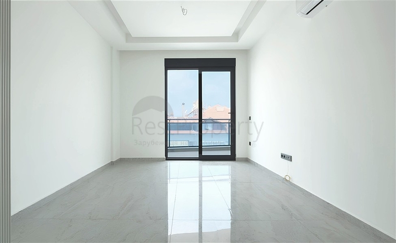 Modern 1+1 apartment in a new complex with sea view in the center of Alanya