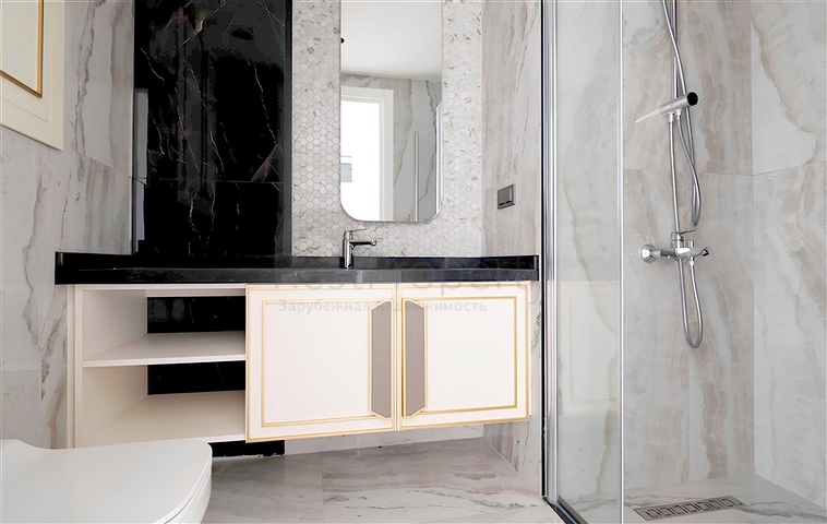 Modern 1+1 apartment in a new complex with sea view in the center of Alanya