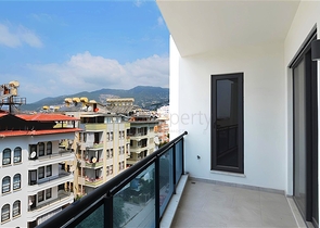 Modern 1+1 apartment in a new complex with sea view in the center of Alanya