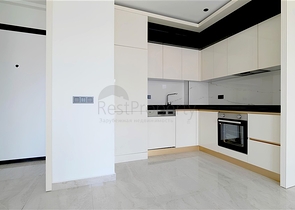 Modern 1+1 apartment in a new complex with sea view in the center of Alanya