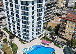 Modern 1+1 apartment in a new complex with sea view in the center of Alanya