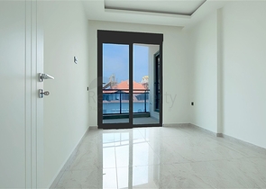 Modern 1+1 apartment in a new complex with sea view in the center of Alanya