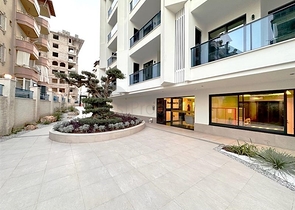 Modern 1+1 apartment in a new complex with sea view in the center of Alanya