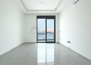 Modern 1+1 apartment in a new complex with sea view in the center of Alanya