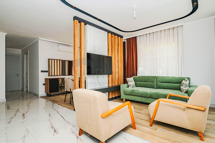 Modern apartment with a garden by the sea in a picturesque area