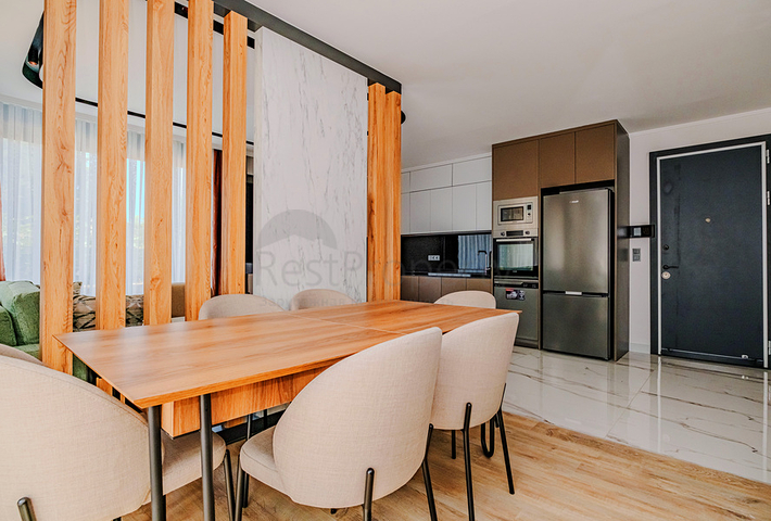 Modern apartment with a garden by the sea in a picturesque area