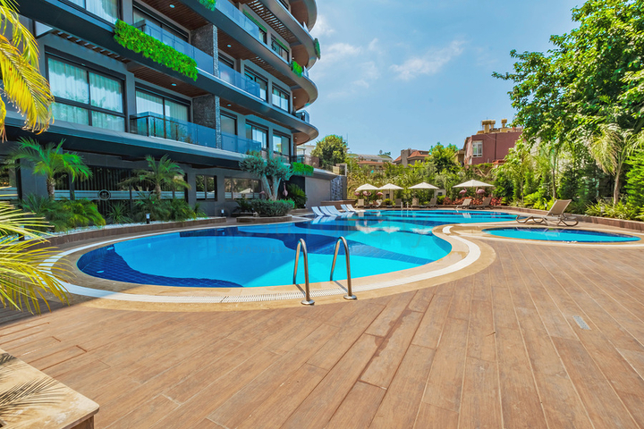 Modern apartment with a garden by the sea in a picturesque area