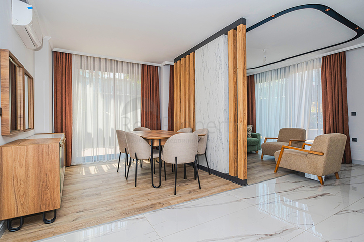 Modern apartment with a garden by the sea in a picturesque area