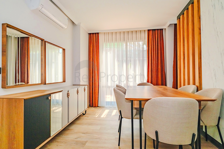 Modern apartment with a garden by the sea in a picturesque area