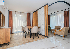 Modern apartment with a garden by the sea in a picturesque area